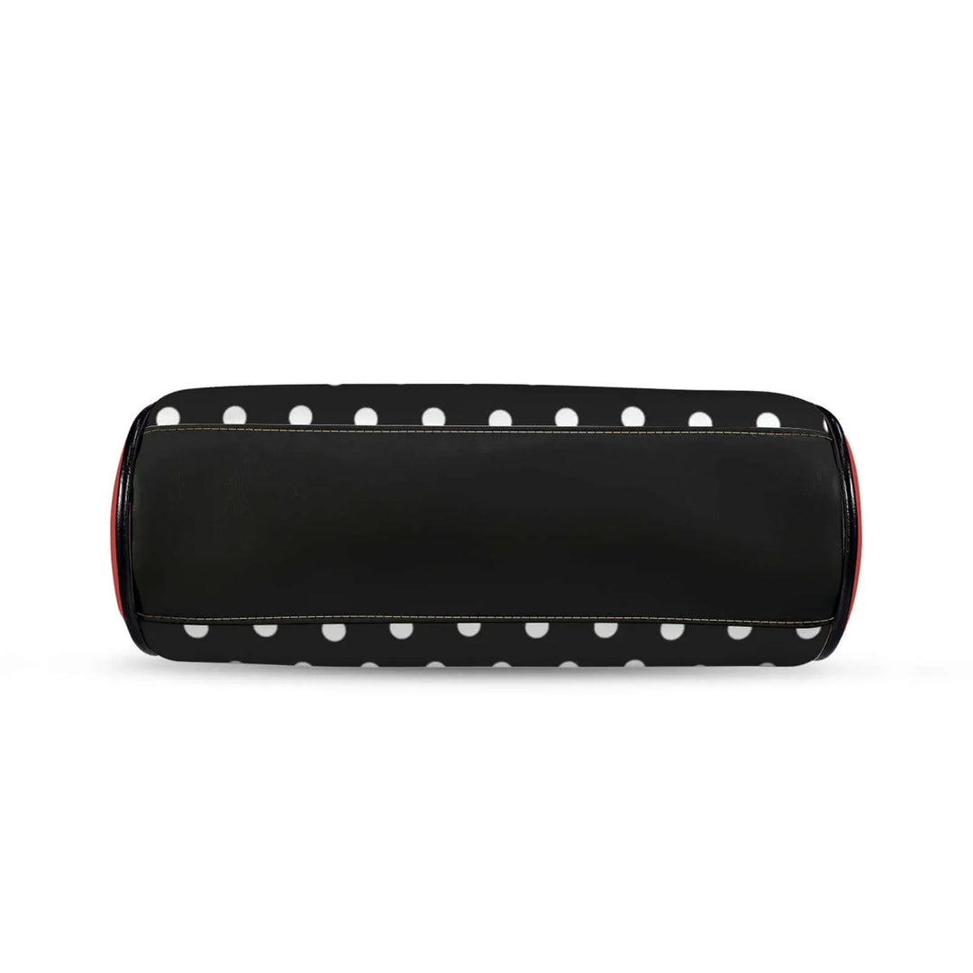 Polly Kisslock Vintage Handbag in black and white polka dots with red trim, showcasing a stylish retro design.