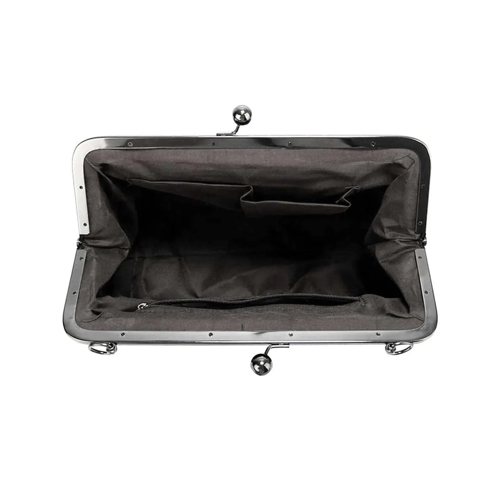 Interior view of the Polly Kisslock Vintage Handbag showing spacious black fabric lining and organizational pockets.