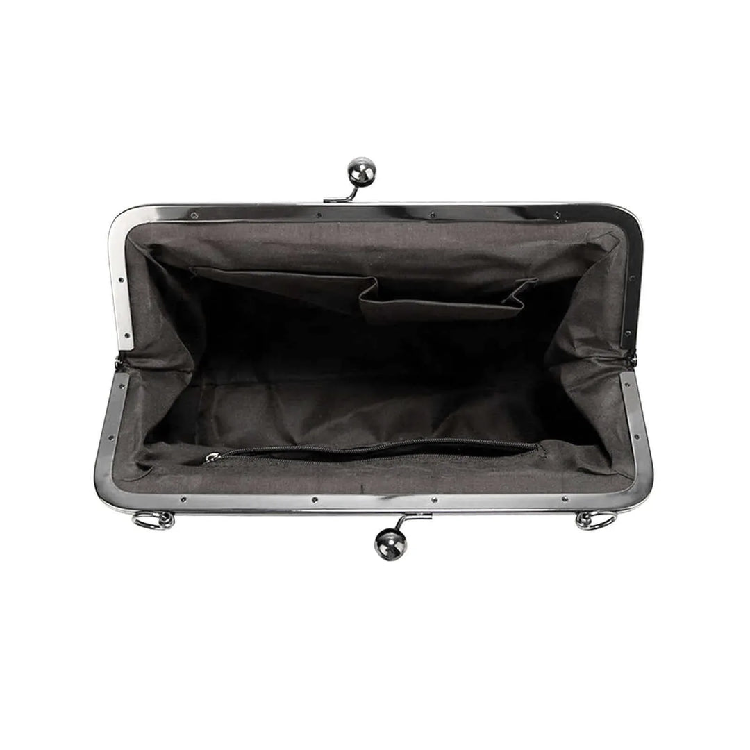 Interior view of the Polly Kisslock Vintage Handbag showing spacious black fabric lining and organizational pockets.