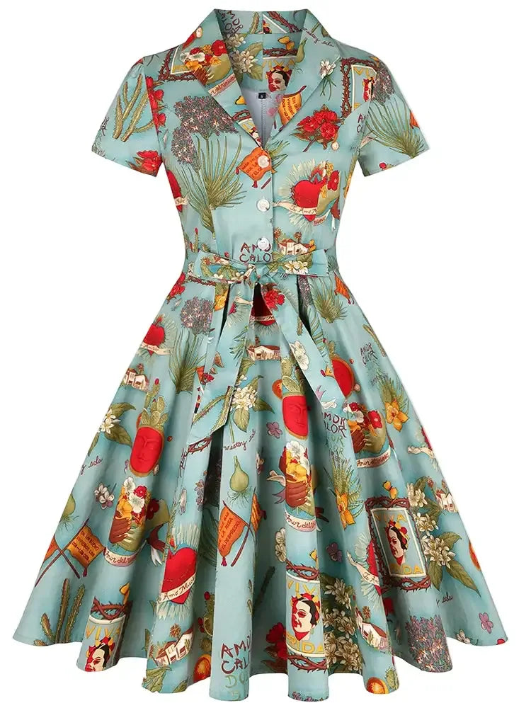 Blue Frida Vintage Swing Dress featuring colorful floral and artistic prints.