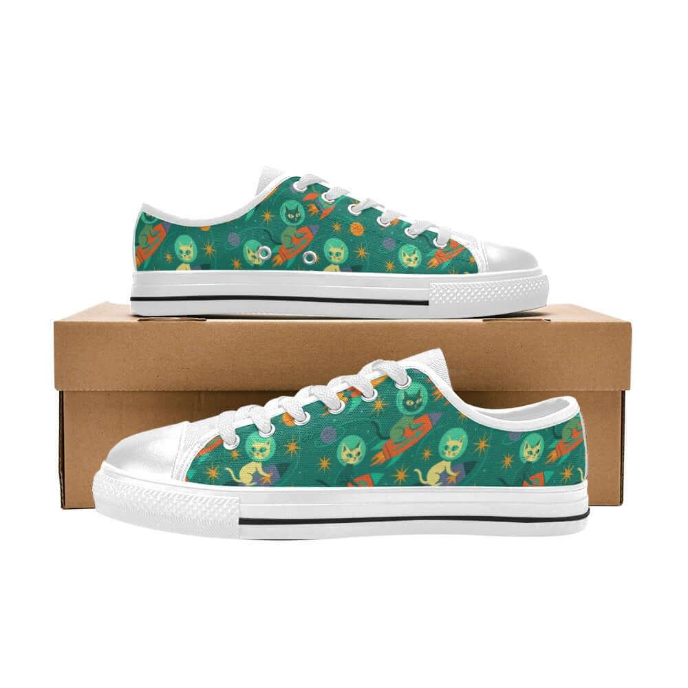 Rocket Cats Kids Sneakers displayed on a box, featuring playful retro space cat designs and vibrant colors.