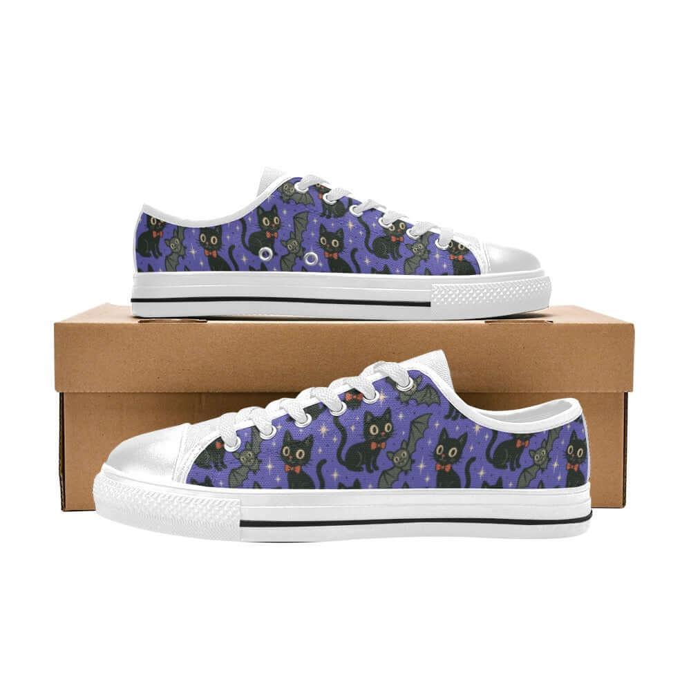 Spooky Cats n Bats Kids Sneakers featuring playful black cats and bats on a purple starry background.