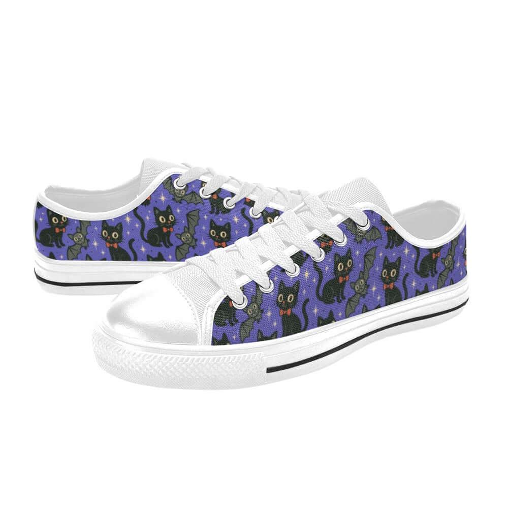 Spooky Cats n Bats Kids Sneakers featuring playful cats and bats on a purple background.