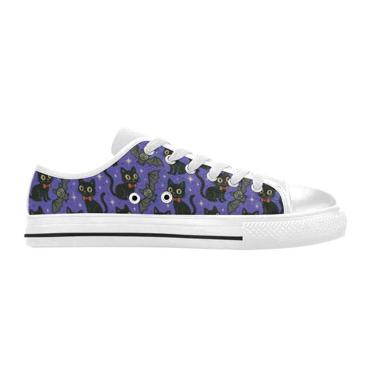 Spooky Cats n Bats Kids Sneakers featuring playful black cats and bats on a purple background.