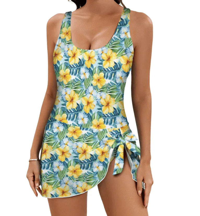 Tropical Hibiscus One Piece Skirted Swimsuit with vibrant floral print and tie-side skirt for beach days.