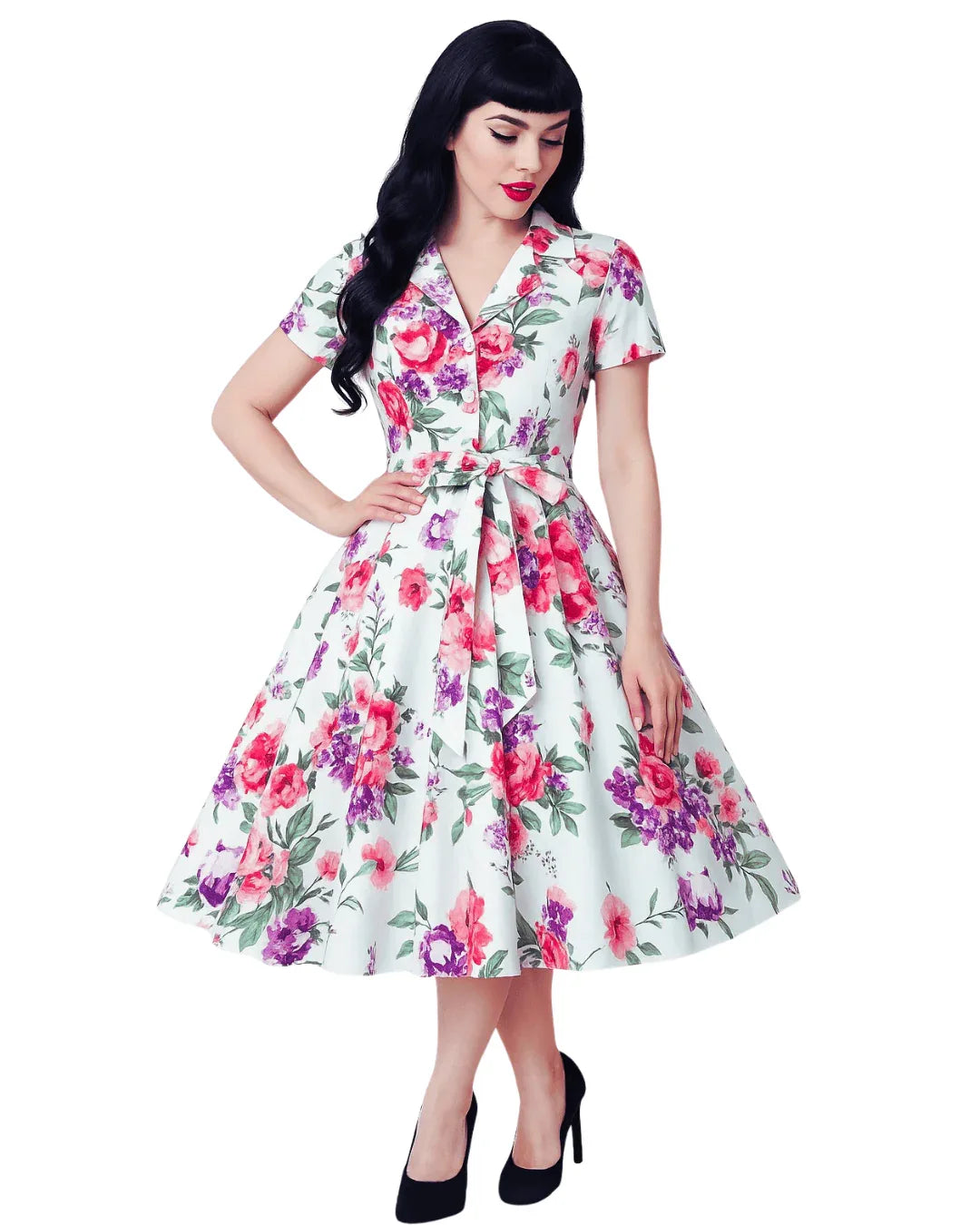 Woman wearing a floral dress on a white background